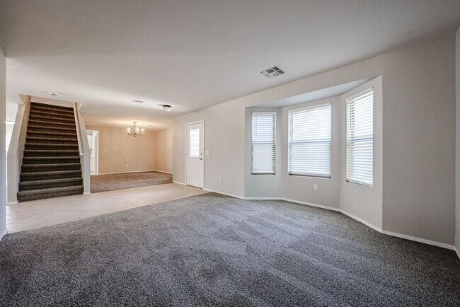 Building Photo - Introducing a stunning 4-bedroom, 2.5-bath...