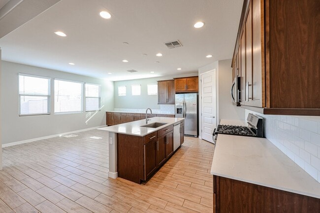 Building Photo - Available August 7th! Gated Community 4 Bedroom 3 Bathroom Home!