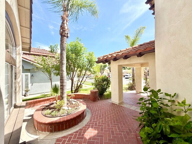 Building Photo - Spacious 5 Bedroom 3 Bathroom Home with Updated Paint, New Roof & Private Balcony