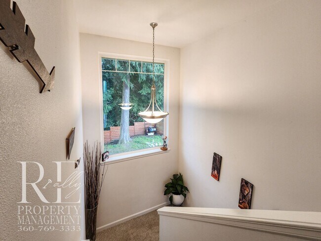 Building Photo - Light-Filled View Home with Vaulted Ceilings & Warm Wood Finishes