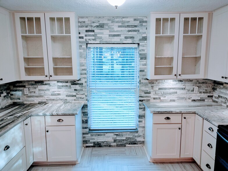 Seeded glass cabinets display your prized showpieces - 2 Arnica Ct
