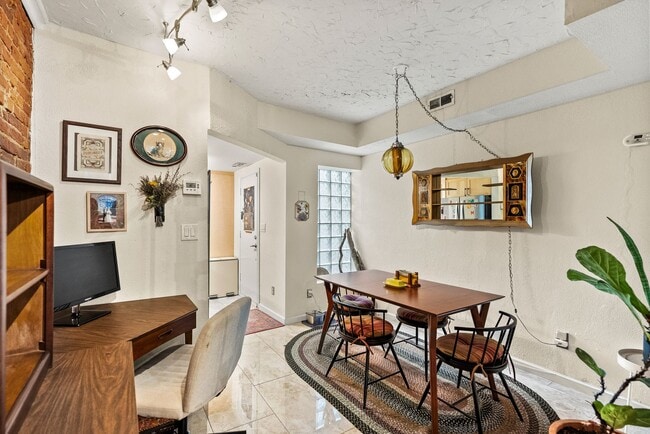 Building Photo - Charming Row Home | 2 Bed | 1 Bath | 950 Sf | Fenced Backyard | 2 Surface Parking Spaces