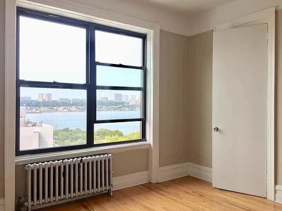 Building Photo - "Charming 1-Bedroom Retreat in Vibrant New York Locale – Your Perfect Urban Sanctuary!"