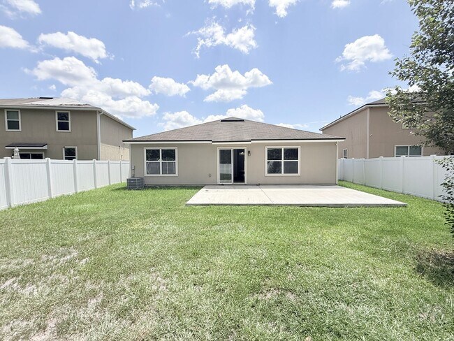 Building Photo - Spacious 4BR Home with Large Fenced Yard & Community Pool