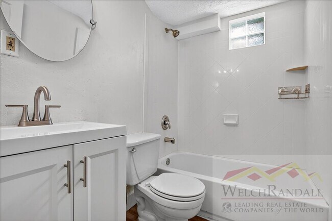 Building Photo - Javid Properties Triplex