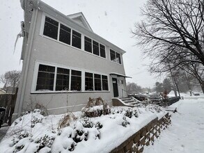 Building Photo - "Spacious 3-Bedroom Minneapolis Gem with Gleaming Hardwood Floors & 2 Full Baths!"