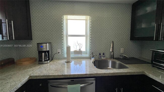 Building Photo - 5701 Collins Ave