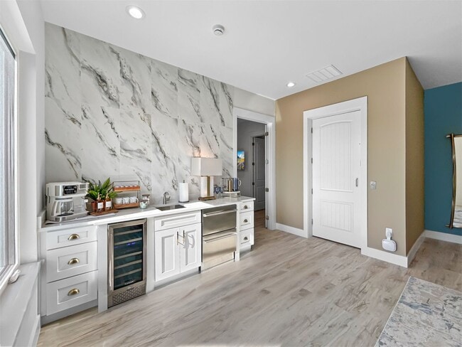 Building Photo - Waterfront Johns Pass Luxury | Steps to Beach + Pool, Hot Tub & Dock