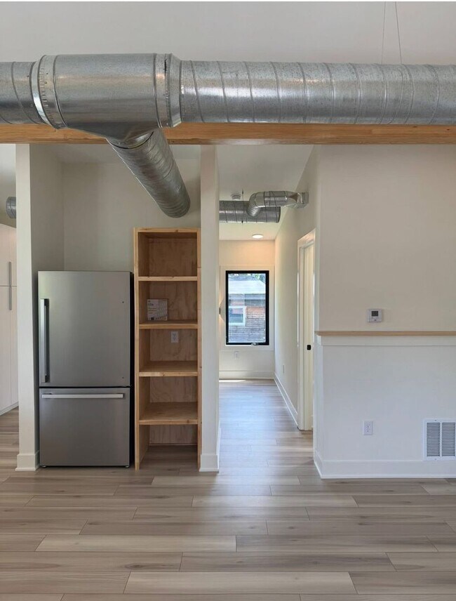 Building Photo - Vaulted Ceilings & Hardwood Floors in This Charming Indianapolis L