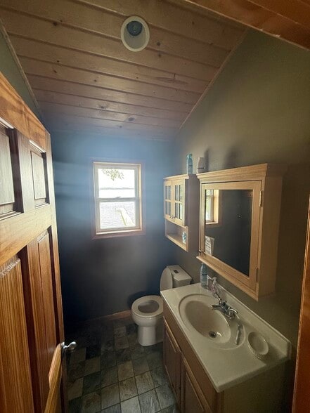 Upstairs Half Bathroom between two bedrooms - 24692 County Highway 4