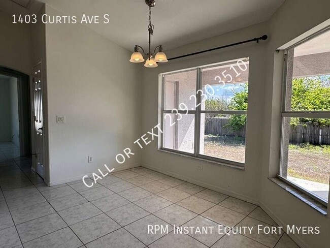 Building Photo - 1403 Curtis Ave S