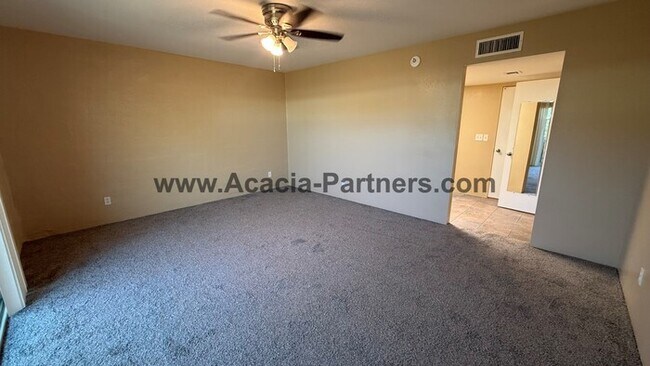 Building Photo - Three bedroom townhome with community pool