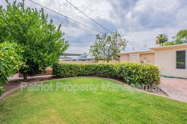 Building Photo - 7024 E Orange Blossom Ln
