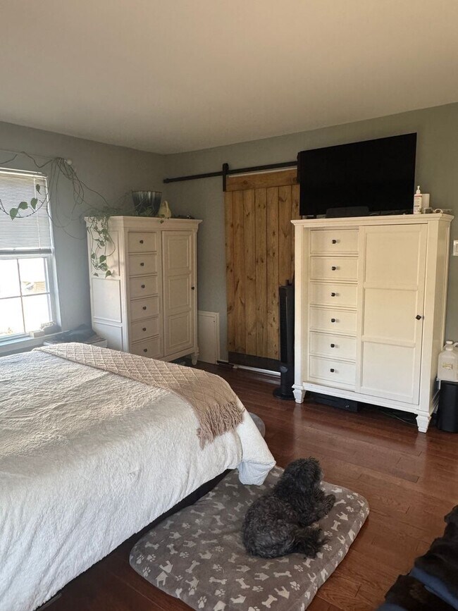Building Photo - Stunning 3–4 Bedroom Townhome in Private Community | Garage + EV Charger | Deck with Tree Views