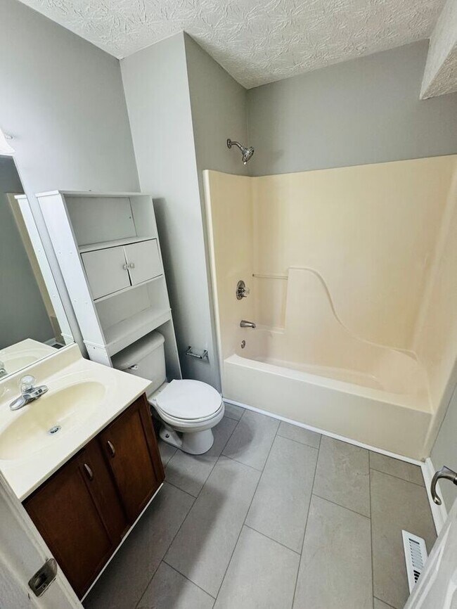 Building Photo - Split-Foyer Charm with Modern Upgrades in West Knox