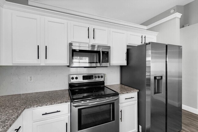 Building Photo - Spacious Renovated 4-Bedroom Home in Land O’ Lakes Near Veterans Expressway