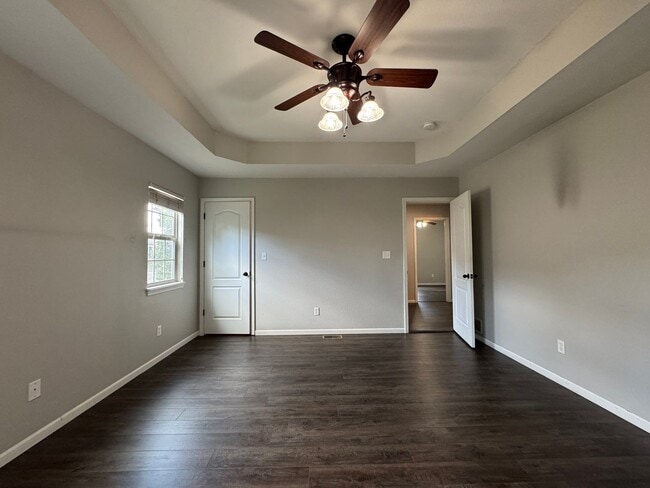 Building Photo - Well Maintained 4 Bedroom with a Privacy F...