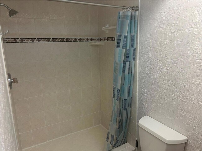 Building Photo - 10845 Del Prado Dr E