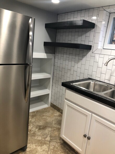 build in pantry, hanging shelves, subway tile - 4155 N Raleigh St
