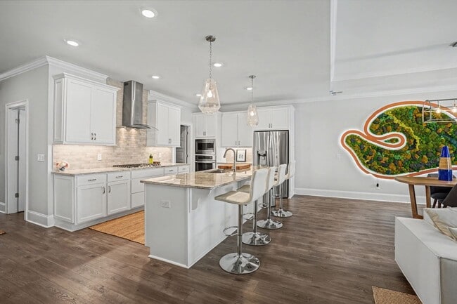 Building Photo - 3 BED | 3.5 BATHS | TWO CAR GARAGE | HERB RIVER | FURNISHED TOWNHOME