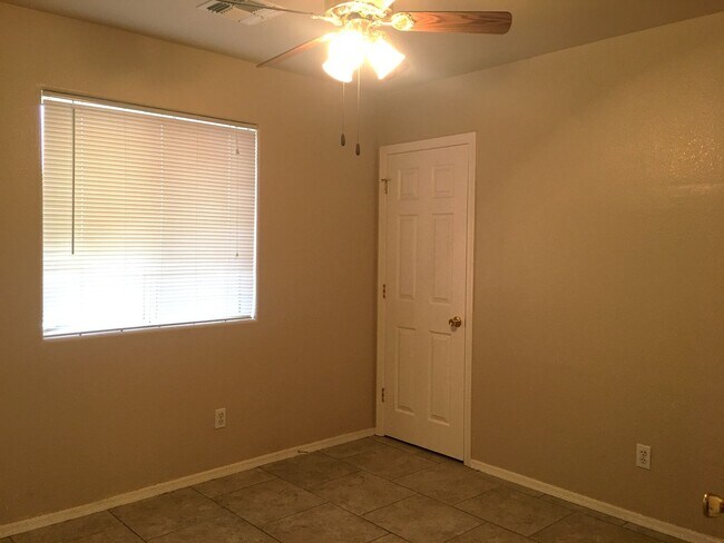 Building Photo - 3-Bedroom Single Family Home with Central Cooling, Attached Garage, and Tile Flooring