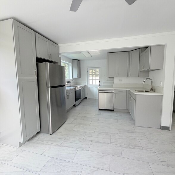 Brand new full size kitchen with all stainless steel appliances including dishwasher! - 1739 Kamohoalii St