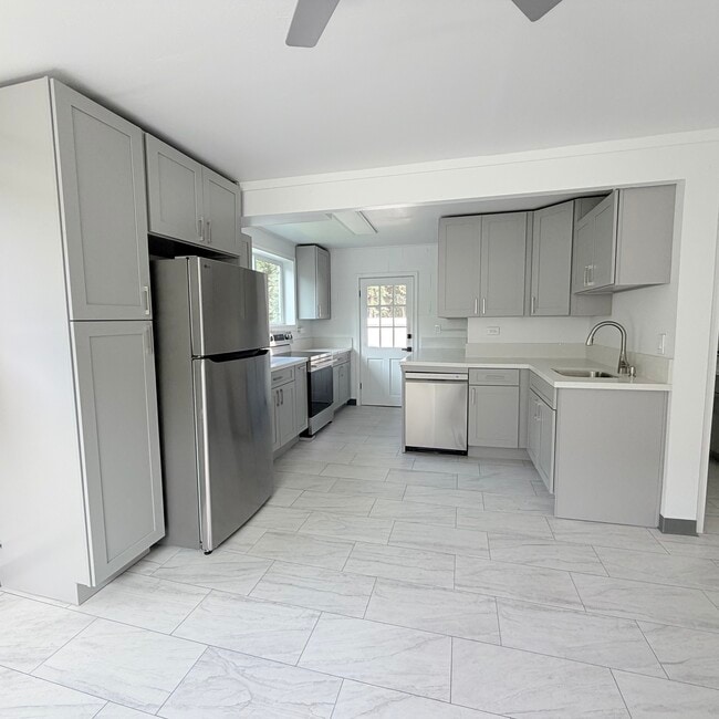 Brand new full size kitchen with all stainless steel appliances including dishwasher! - 1739 Kamohoalii St