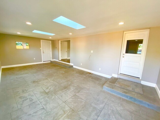 Building Photo - Spacious & Updated Home in Lakewood!-Open Floor plan, Outdoor Living Space, Garden Beds, & More!!!