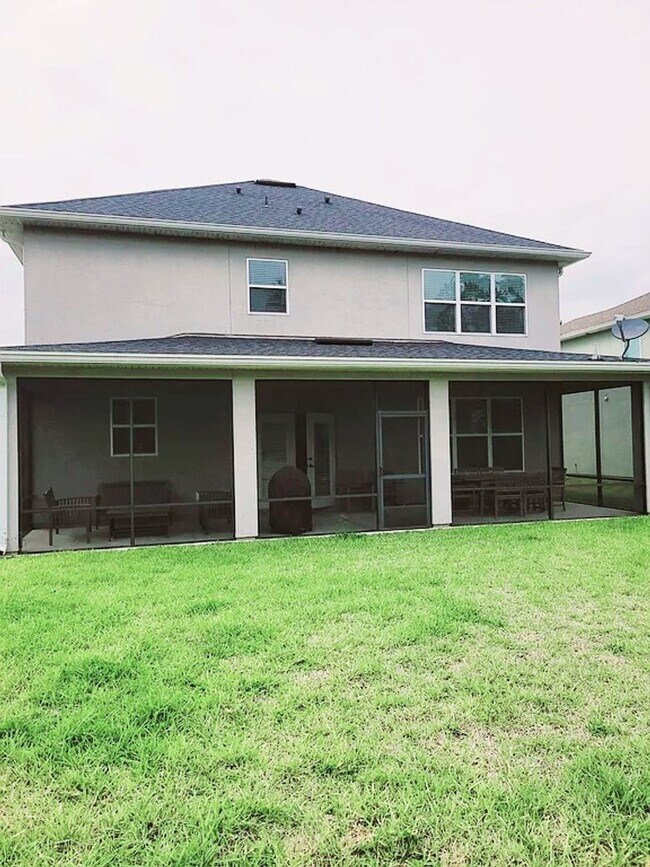 Building Photo - Spacious 4-Bedroom Home in Amelia Walk wit...