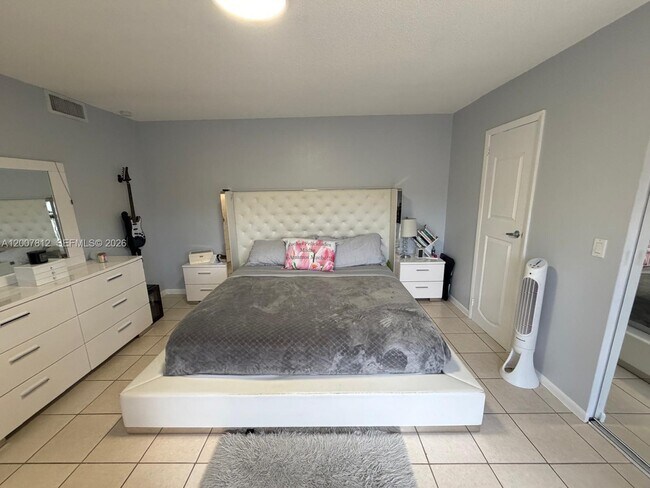 Building Photo - 6580 W 24th Ct