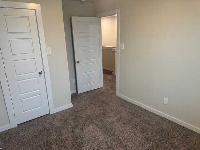 Building Photo - Stylish, Spacious & Close to It All – Your Ideal Townhome Awaits!
