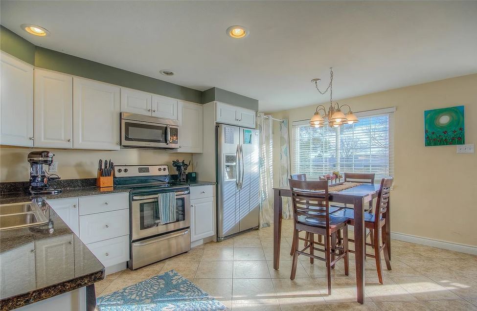 Kitchen - off entrance - 13963 E Jewell Ave