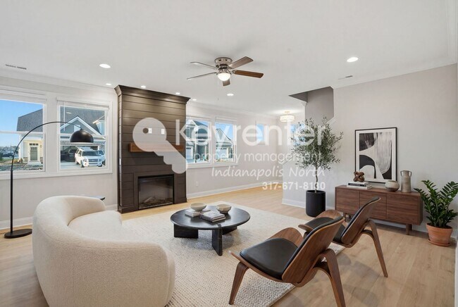 Building Photo - Located in Westfield, IN, this attractive 3-bedroom, 2.5-bath home sits on a corner lot within an...