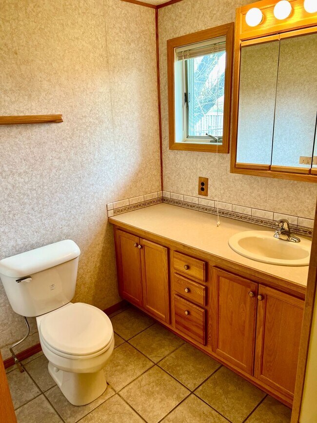 Building Photo - Pet Friendly 2 Bed 2 Bath Single Family Home With Garage, Private Deck and Big Yard!