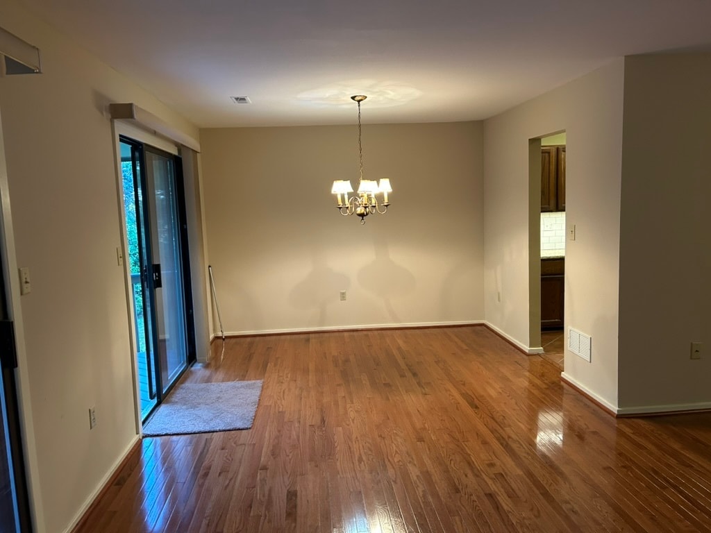 Dining room area, with sliders to deck on left and entrance to kitchen on right - 443 Lynetree Dr