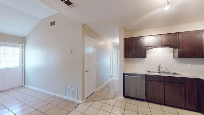 Building Photo - 2 WEEKS FREE! ALL TILE 3 BEDROOM, 2 BATH, ...