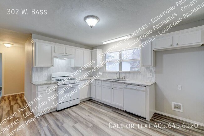 Building Photo - 302 W. Bass-