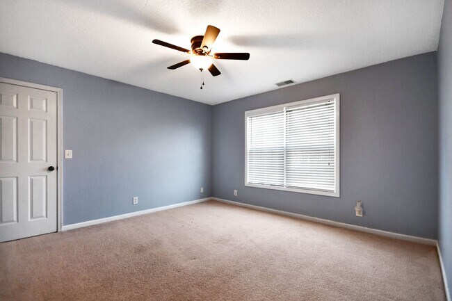 Building Photo - Pet Friendly Three Bedroom with Bonus!