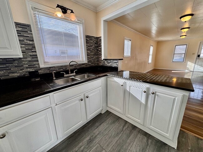 Building Photo - Move-In Ready 4BR Home with Finished Basement, Flex Space & Large Yard