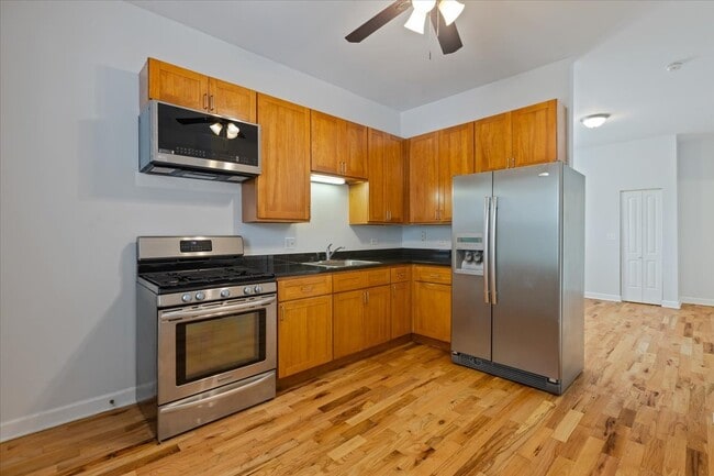 Building Photo - 1234 W 49th Pl