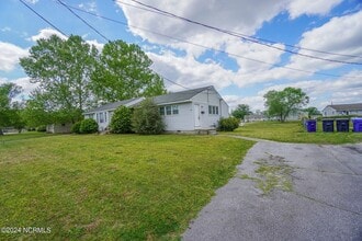 Building Photo - Lawn Care Included in Jville City Limits!