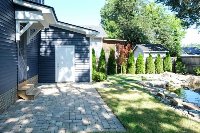 Building Photo - Like-new 3 bedroom, 2.5 bath house with an organic pond!