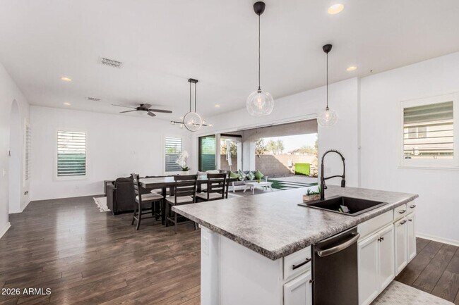 Building Photo - SFH 4-3 with splashpad and beautiful outdoor living