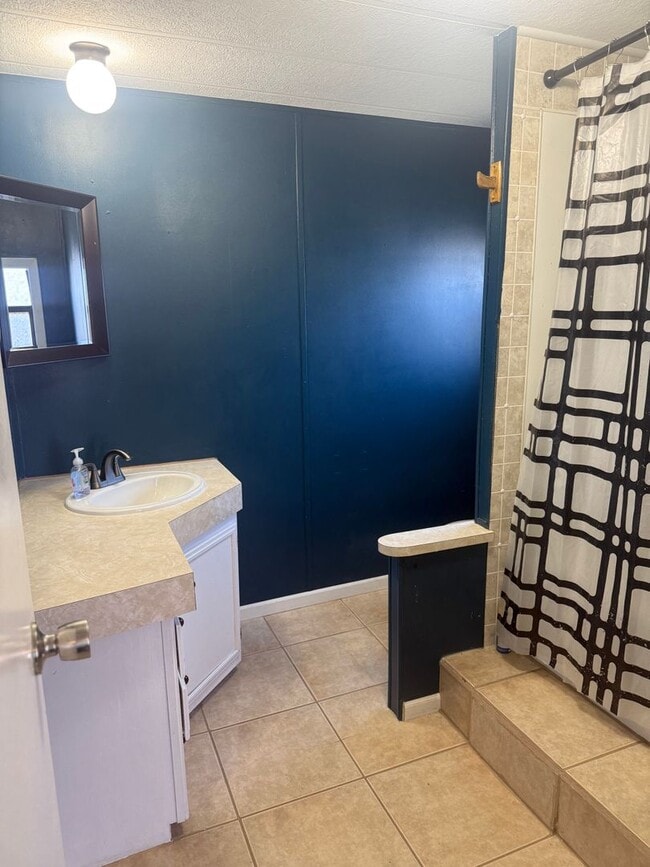 Building Photo - Spacious 3-Bedroom with Storage Shop & Off...