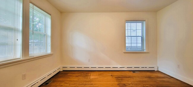 Building Photo - Remodeled brick bungalow with 1st floor li...
