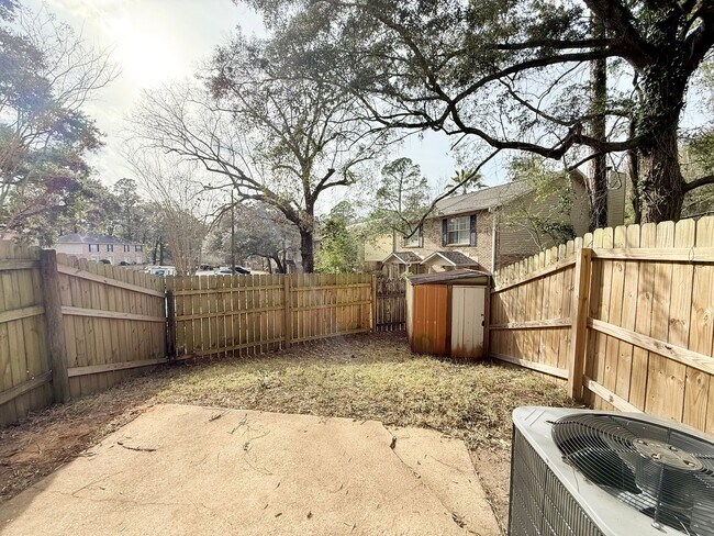 Building Photo - Spacious 2-Bedroom Townhome - Fenced Backyard
