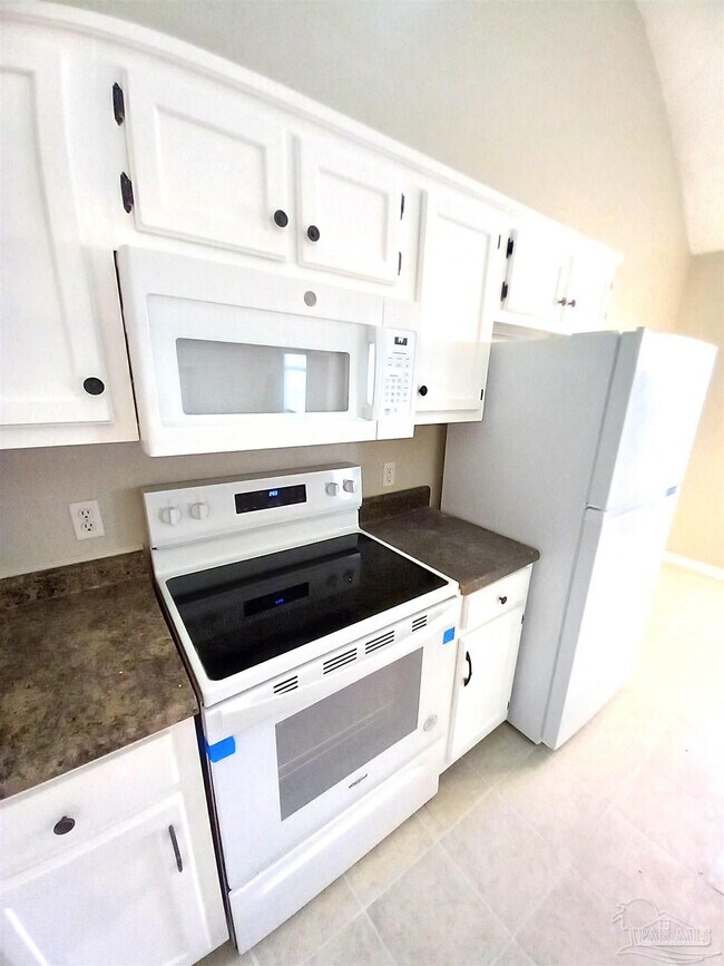 Building Photo - 7009 Weatherwood Dr