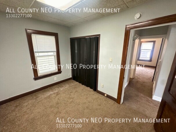 Building Photo - Cozy 2-Bedroom with Ample Storage and Char...