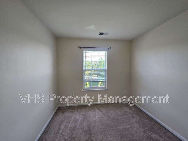 Building Photo - 6186 Library Ln