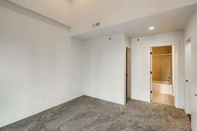 Building Photo - Modern LoHi Living with Rooftop Deck & City Views!!